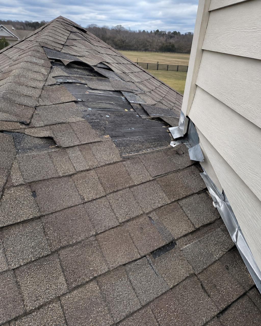 Roof damage in Grain Valley